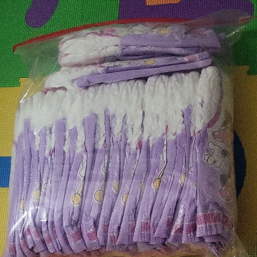 PACKAGE 27- Purple and White Baby Diapers -4T-5T